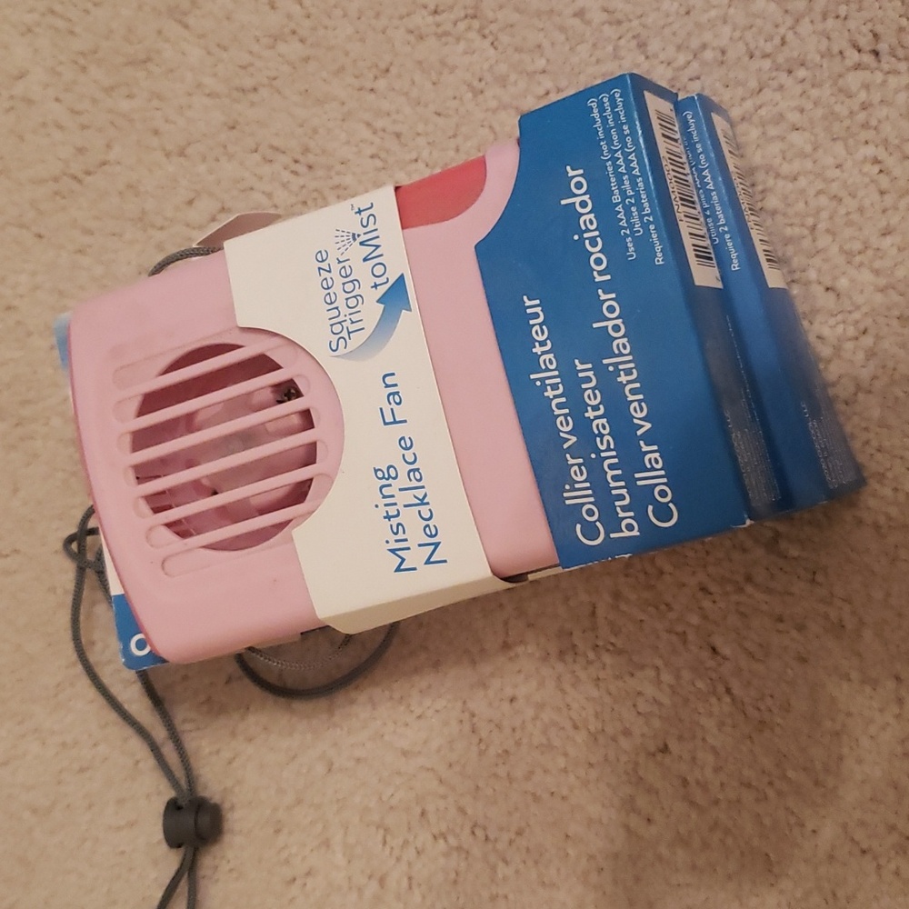 O2Cool Misting Necklace Fan in Pink takes 2 AAA Batteries not included
